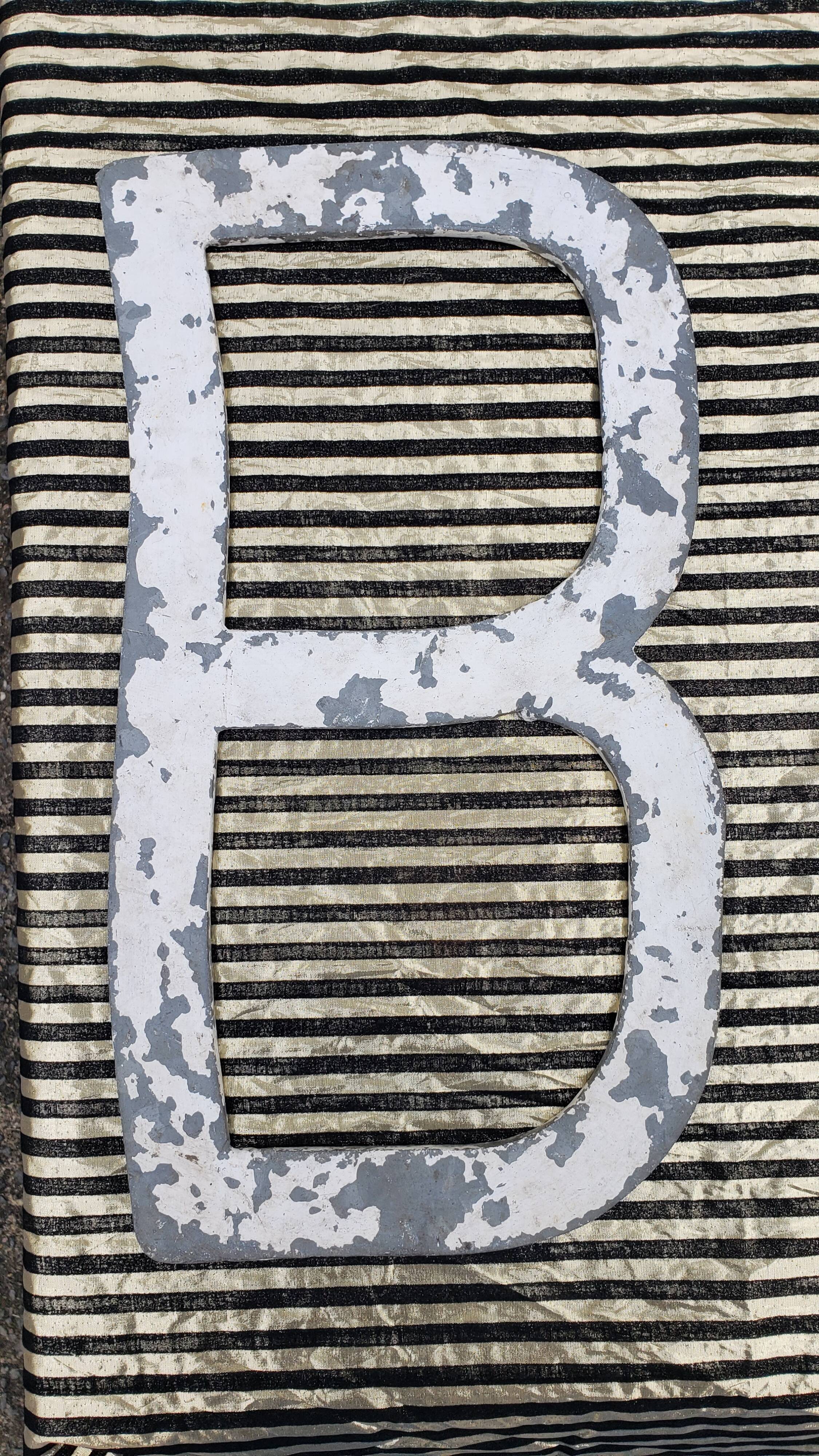 Letter B in galvanized metal