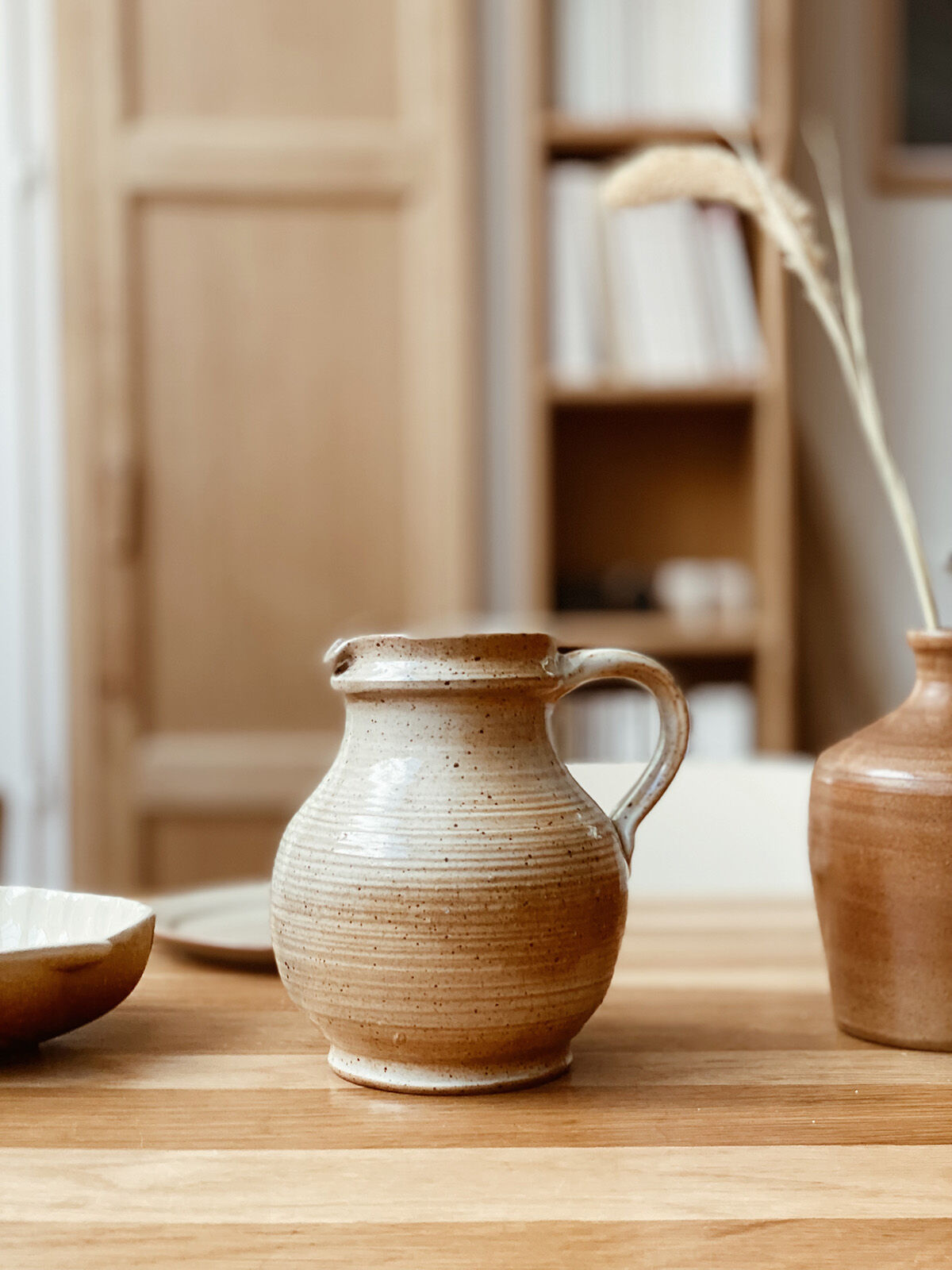 Beige stoneware pitcher
