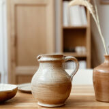 Beige stoneware pitcher