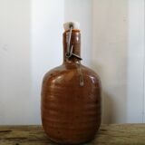 Old bottle of varnished sandstone