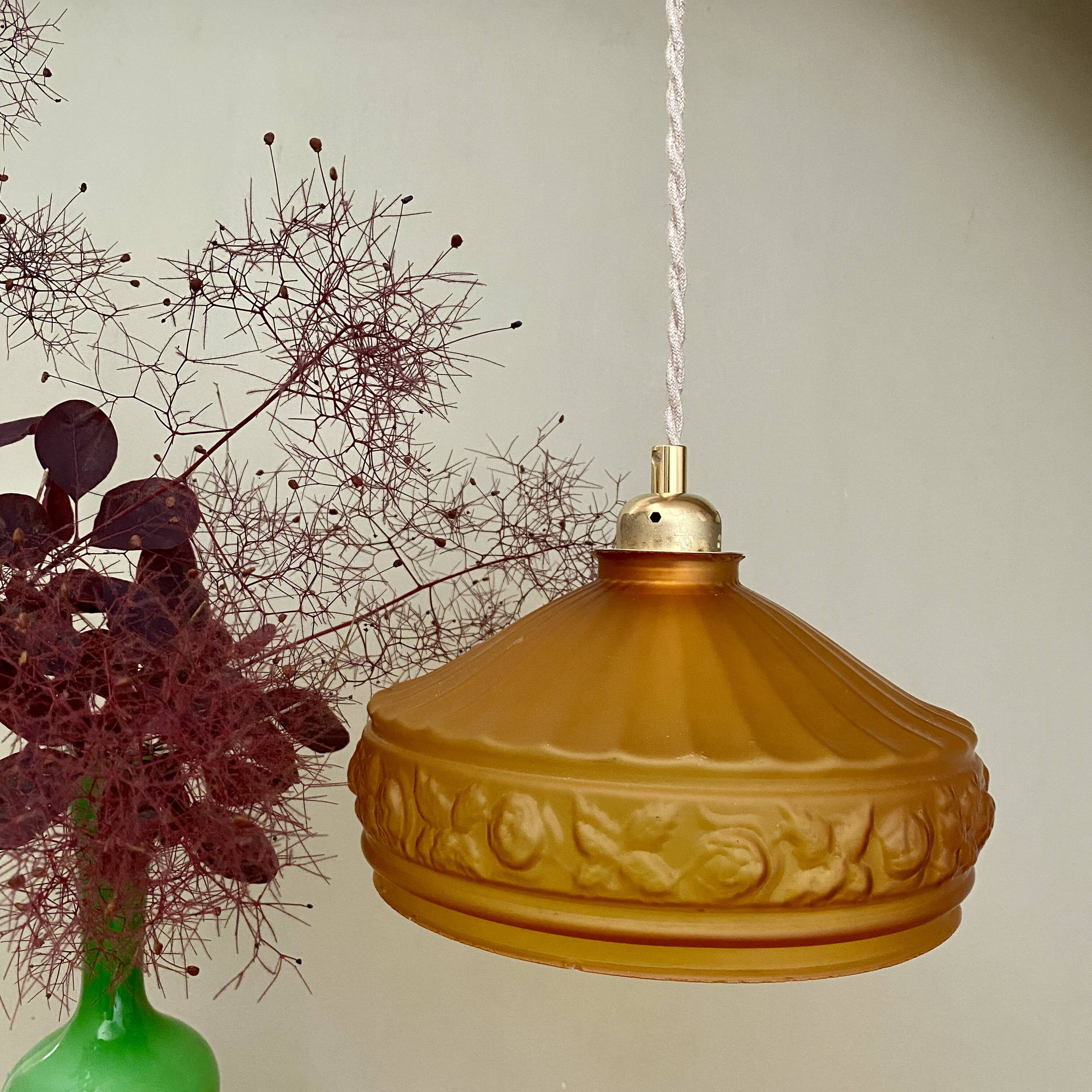 Pendant light with old art deco lampshade in yellow glass