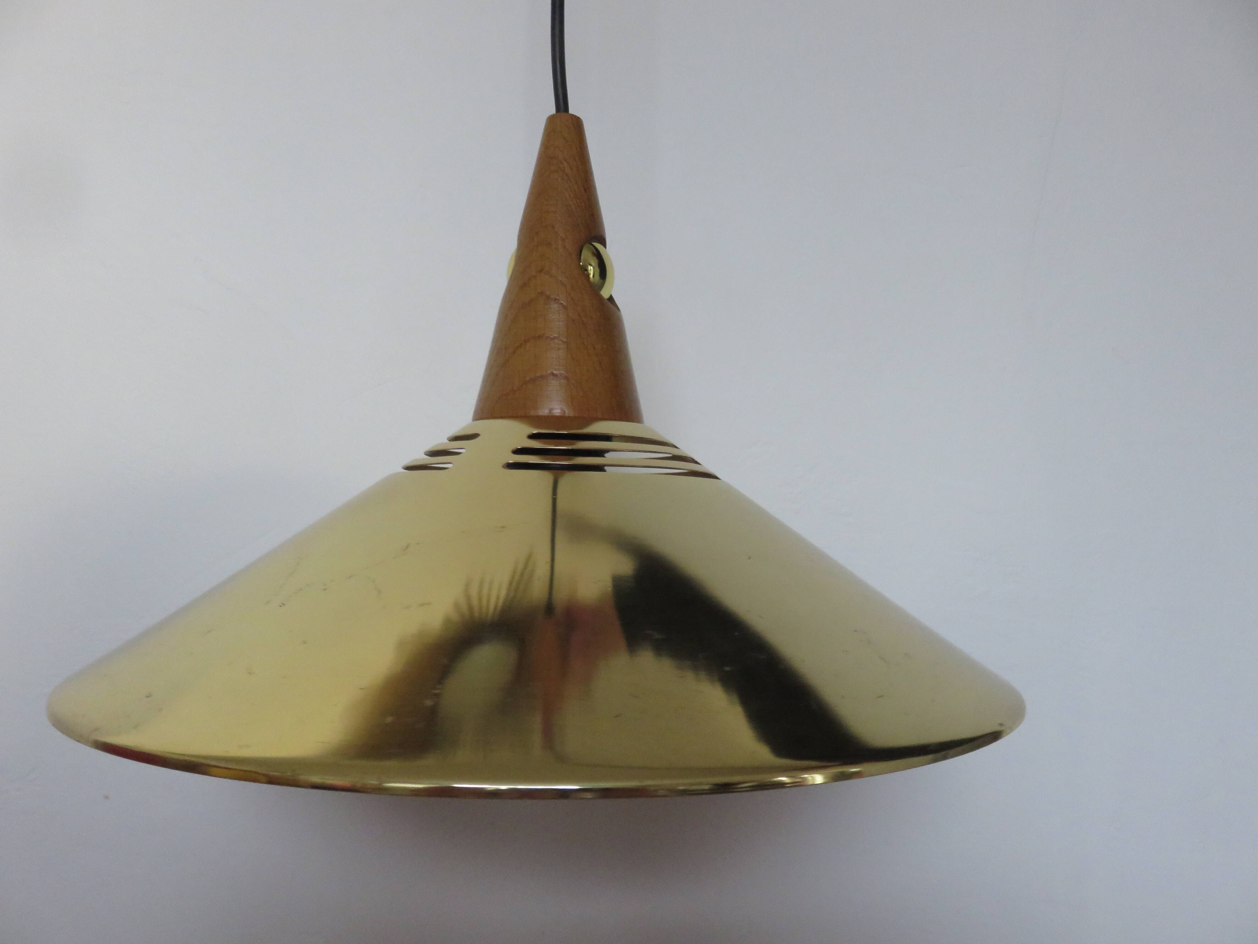 Scandinavian teak and gold metal pendant light from the 70s