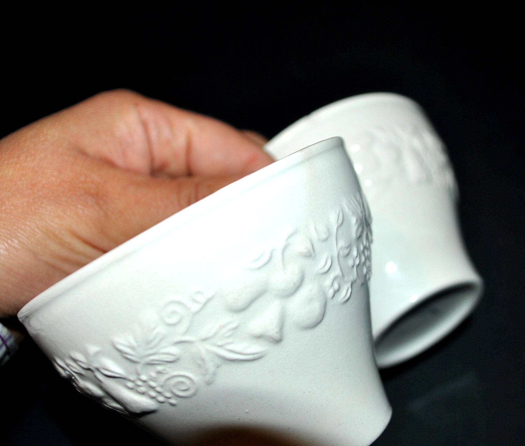 Set of 2 cups molded in opaque Sarreguemines earthenware