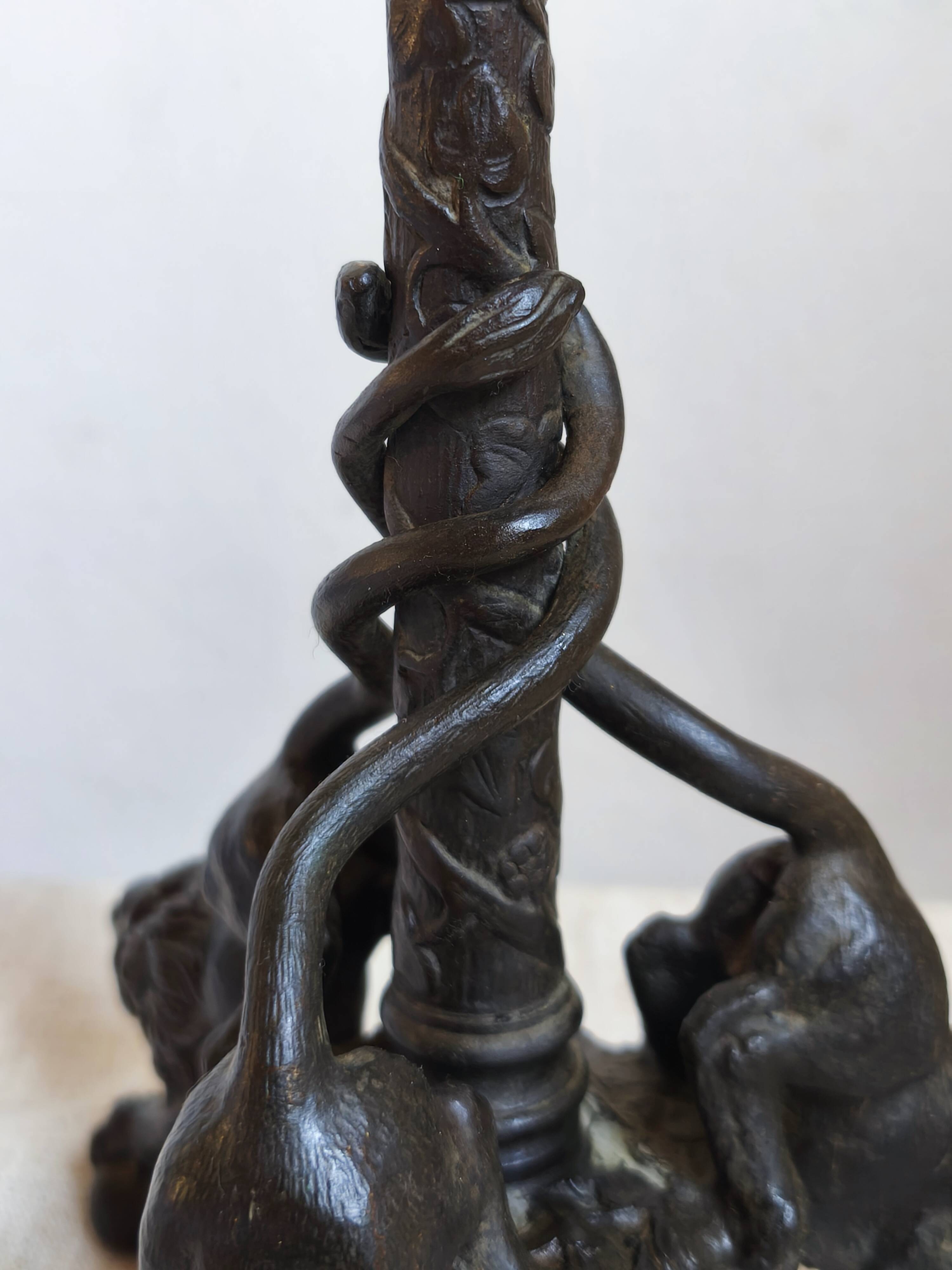 Vintage table lamp in patinated bronze with lion decor, 1950s.