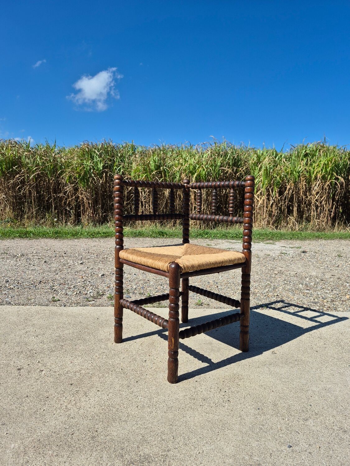 Vintage Dutch rustic corner chair bobbin turned oak with rush seating
