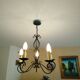 Antique wrought iron chandelier with 5 branches.