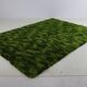 Beau tapis vert mélangé
