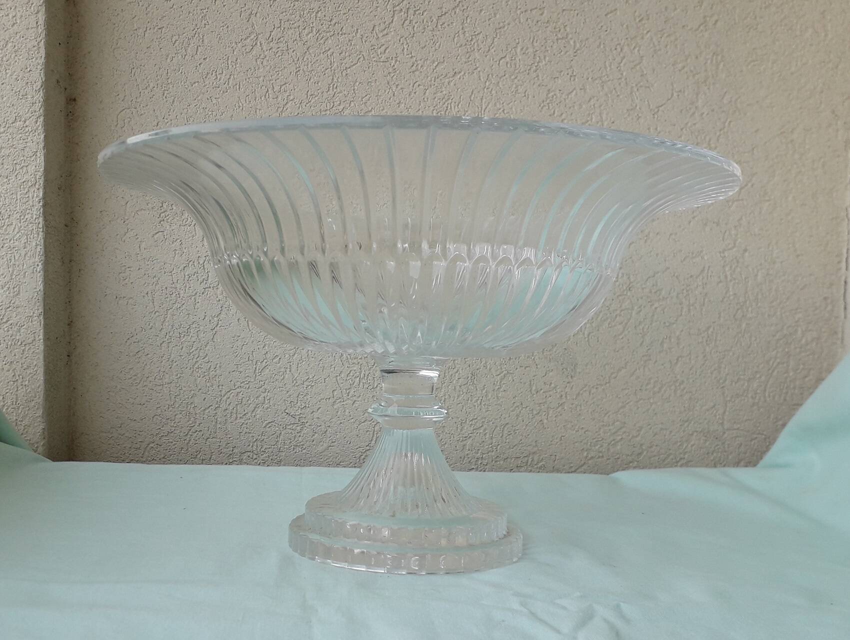 Glass coupe on a stand