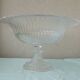 Glass coupe on a stand