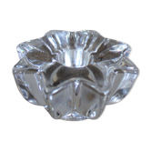 A vintage star flower glass candlestick.