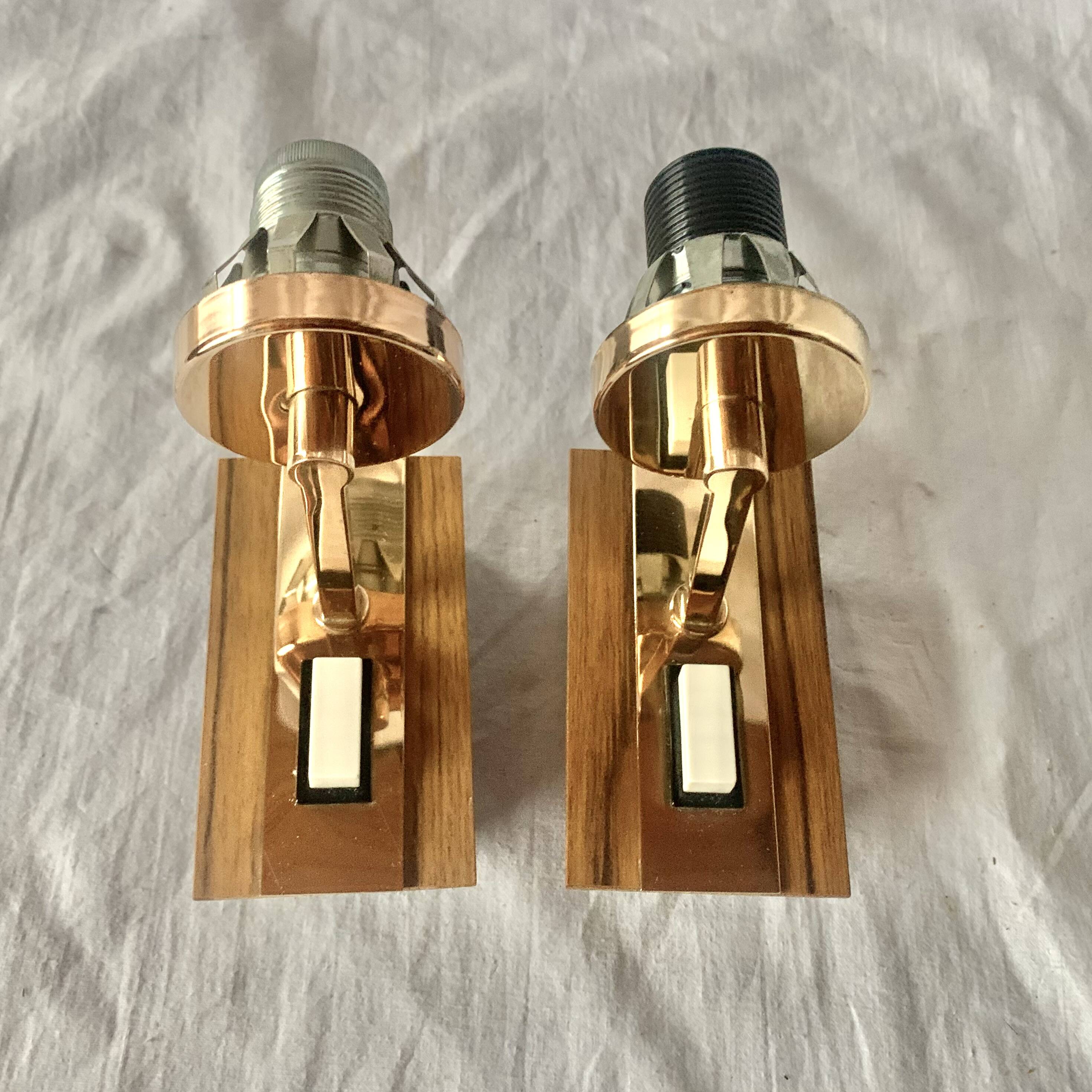 Pair of vintage wall sconces in molded glass and gilded brass