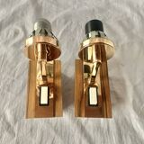Pair of vintage wall sconces in molded glass and gilded brass