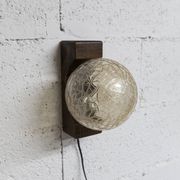 1960s ball wall light in dark wood and amber glass