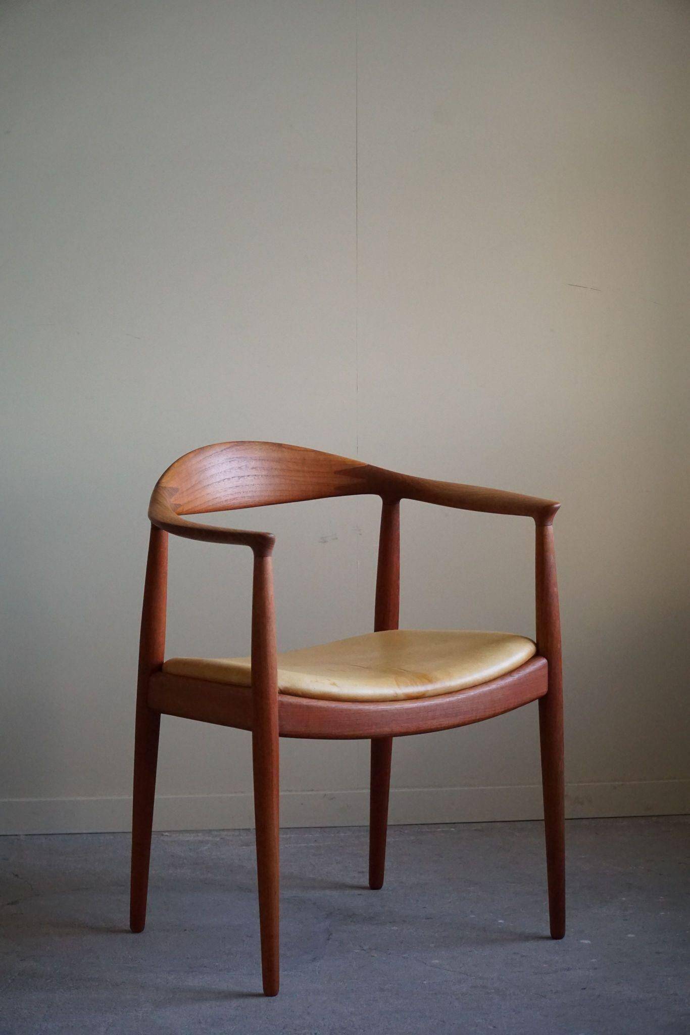 Hans J. Wegner, Teak and leather armchair, model "The Chair" JH501, 1950s