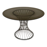 Space Age round dining table in chrome metal and smoked glass.