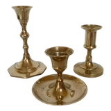 Trio of brass candle holders