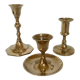Trio of brass candle holders