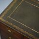 Reprodux Bevan Funnell chest of drawers with a leather top