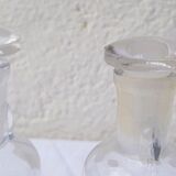 6 glass vials with glass plugs