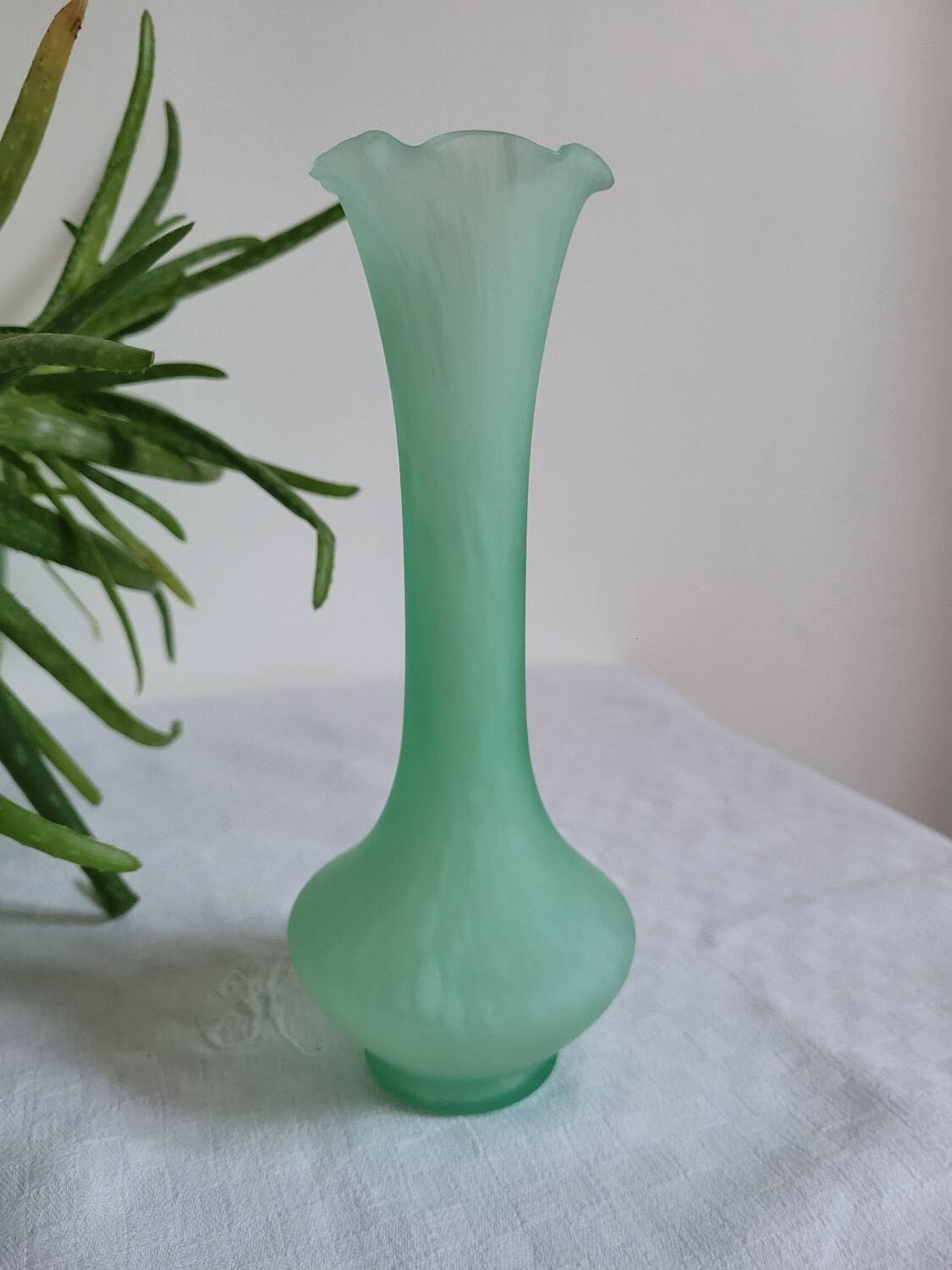 Green and white glass paste single flower vase