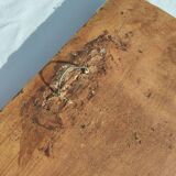 Bas-relief plaster scene of horses and a cart.