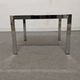 Bedside table or end of sofa in chromed metal and smoked glass from the 70s