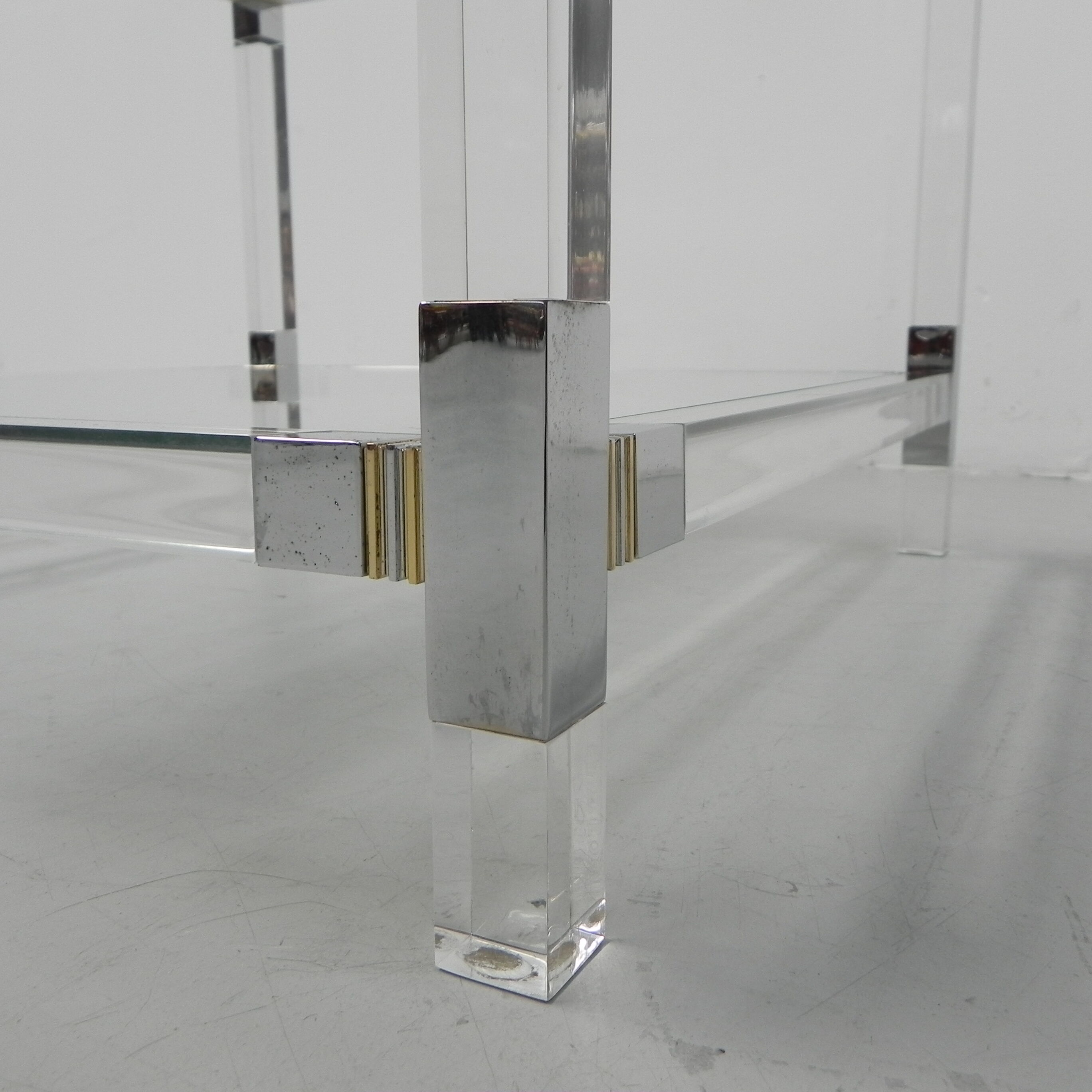 Hollywood Regency coffee table with perspex frame