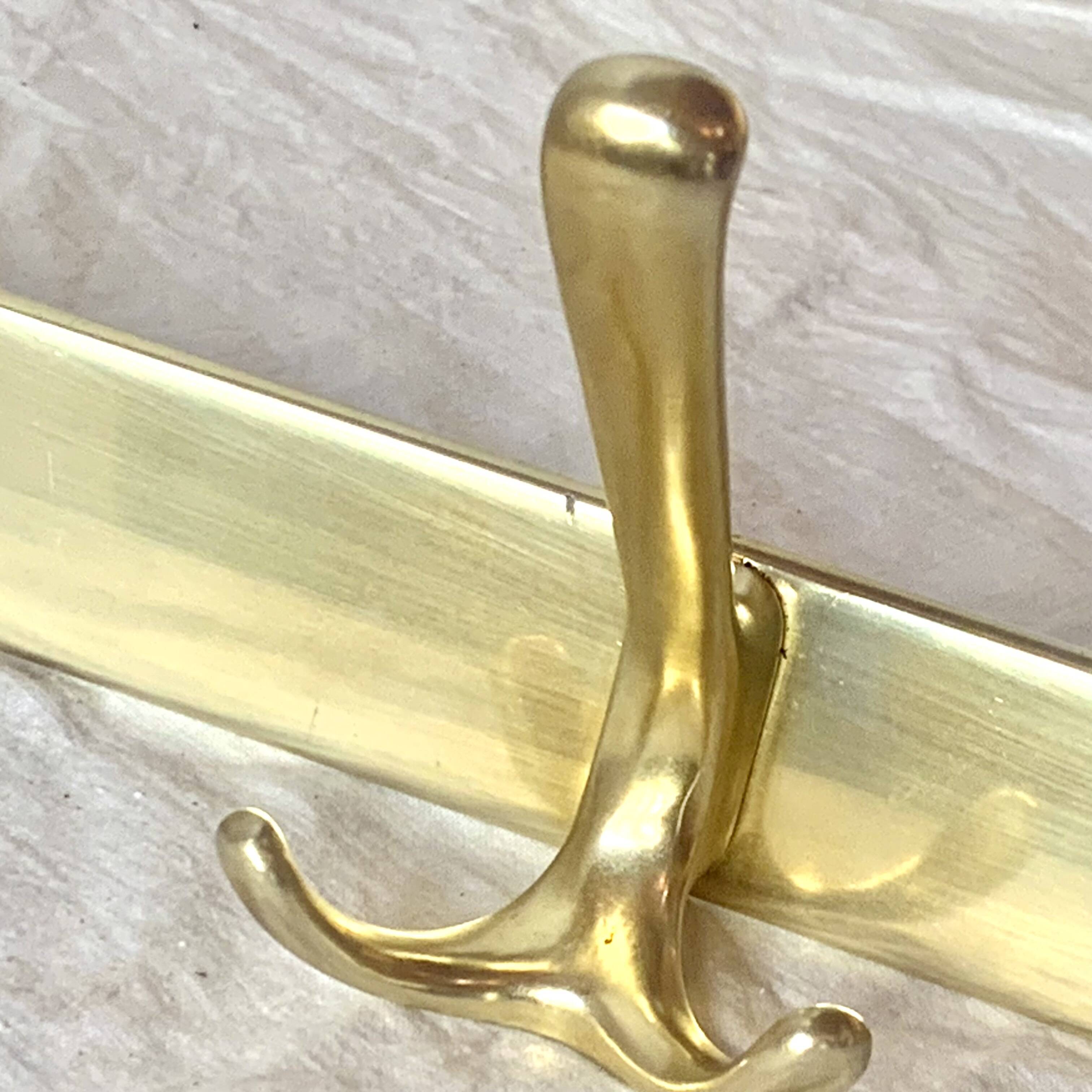 Vintage gold aluminum coat rack with three hooks