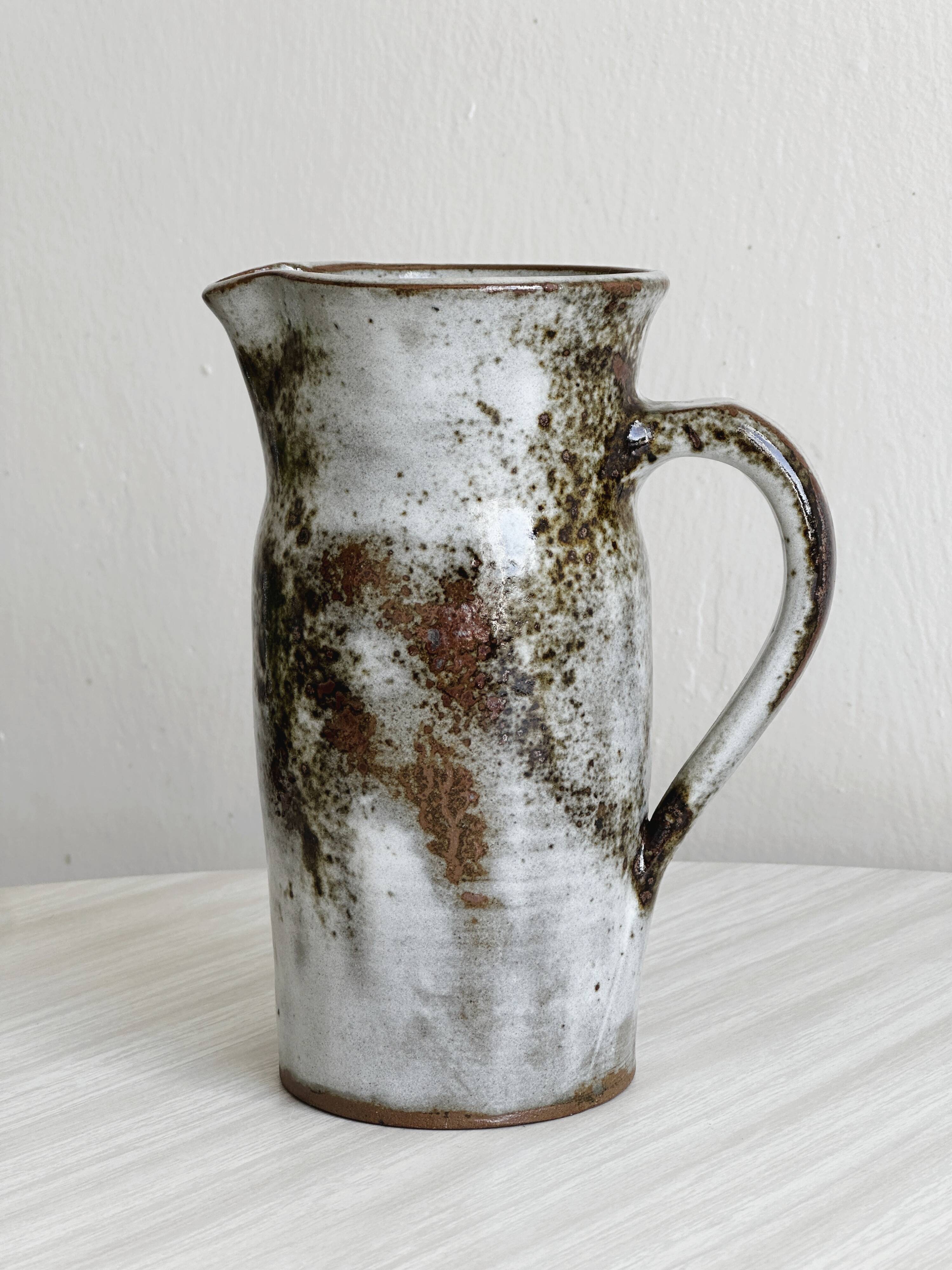 Small sanded stoneware pitcher signed Chantal and Thierry Robert