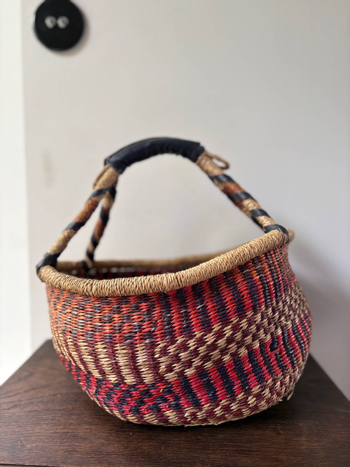 Vintage colorful woven rush ethnic basket