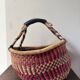 Vintage colorful woven rush ethnic basket