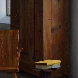 Sculptural African stool in hardwood, curved seat and architectural base, 1970s.