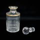 Flacon Baccarat modèle Nancy, cristal taillé et liseré doré, avant 1936