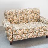 2-seater sofa, floral fabric, wooden structure, plastic and wooden legs, 1970