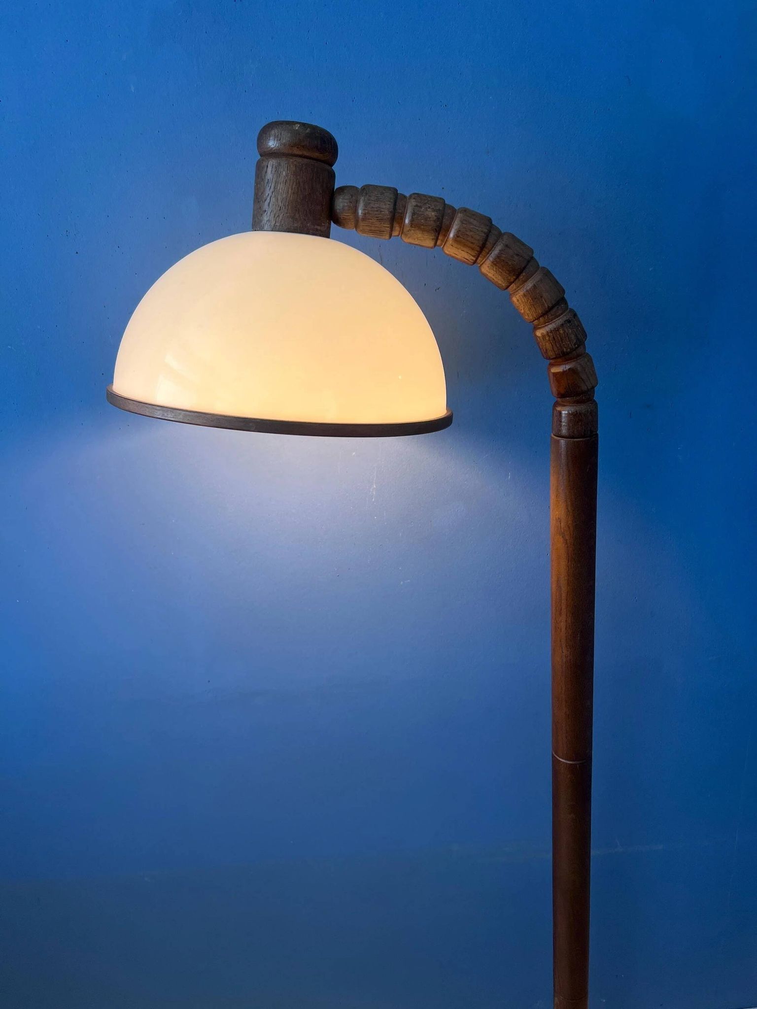 Mid-century floor lamp in brown wood by Steinhauer with an acrylic glass shade.