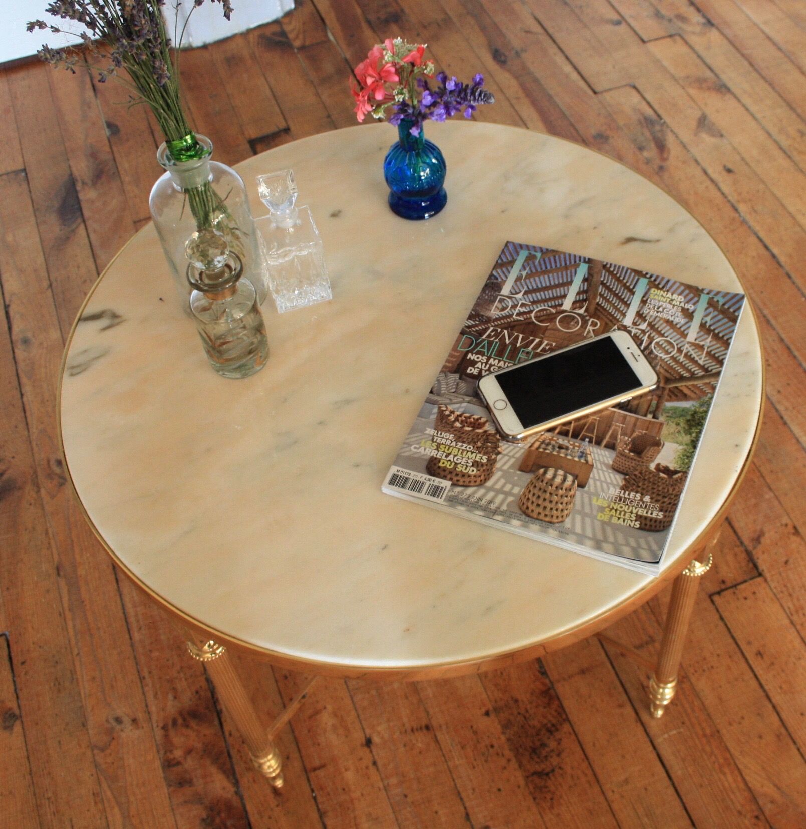 Marble and brass round coffee table