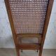 Art Deco caned chair with bronze ornaments.
