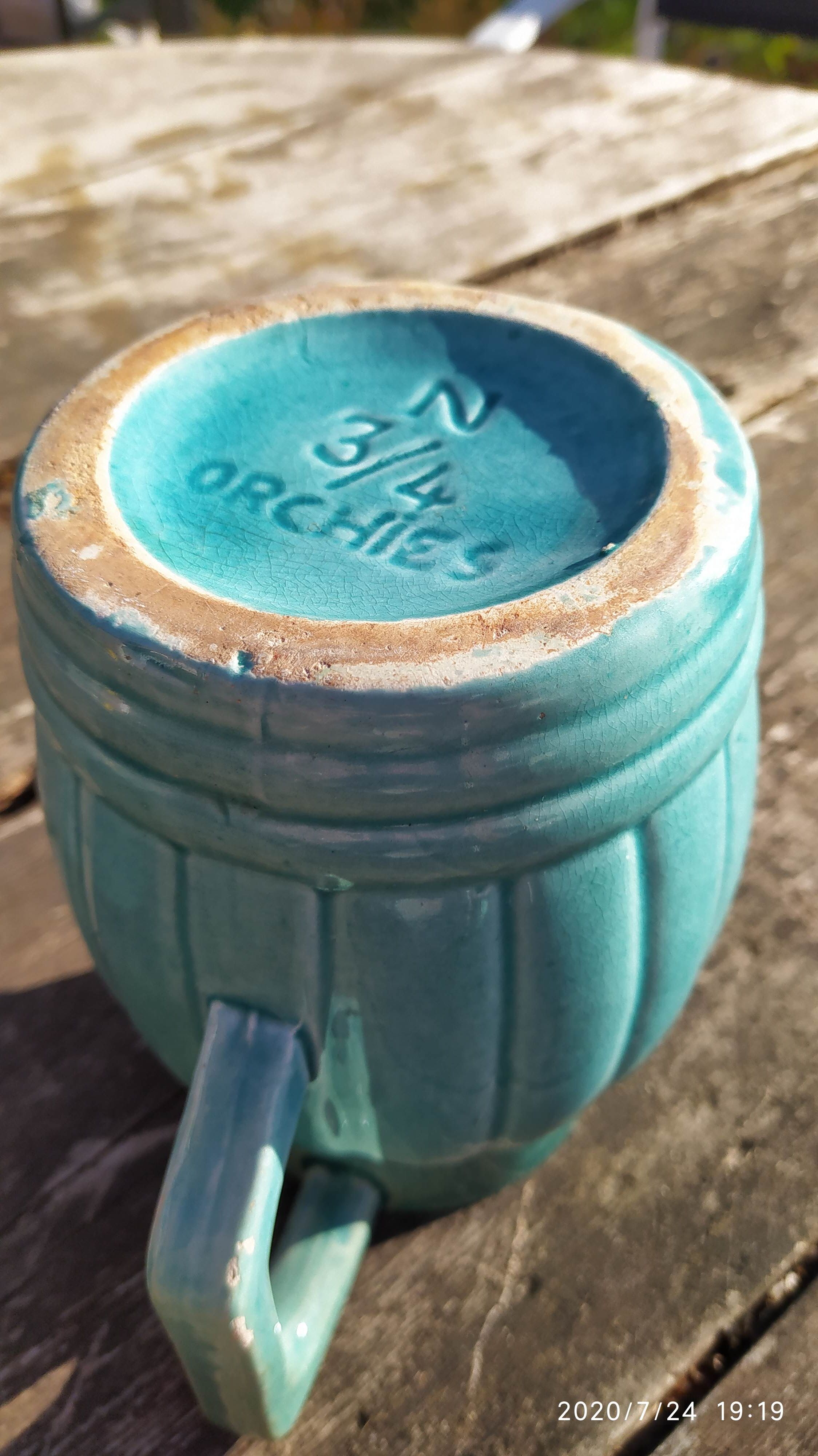 Old orchie ceramic pitcher