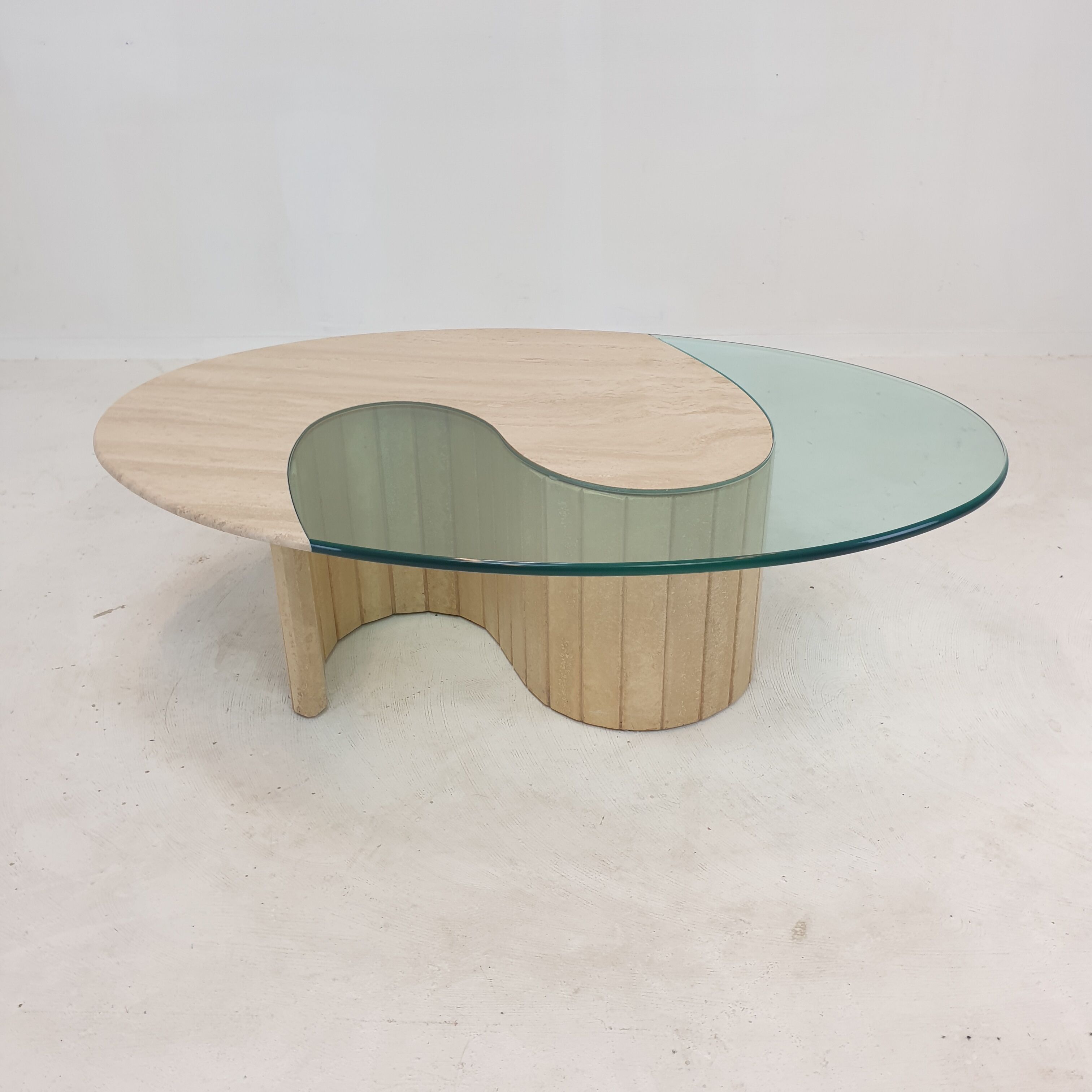 Italian travertine and glass coffee table, 1980's