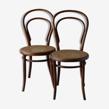 Two Turpe canned Bistro 1900 color rosewood chairs