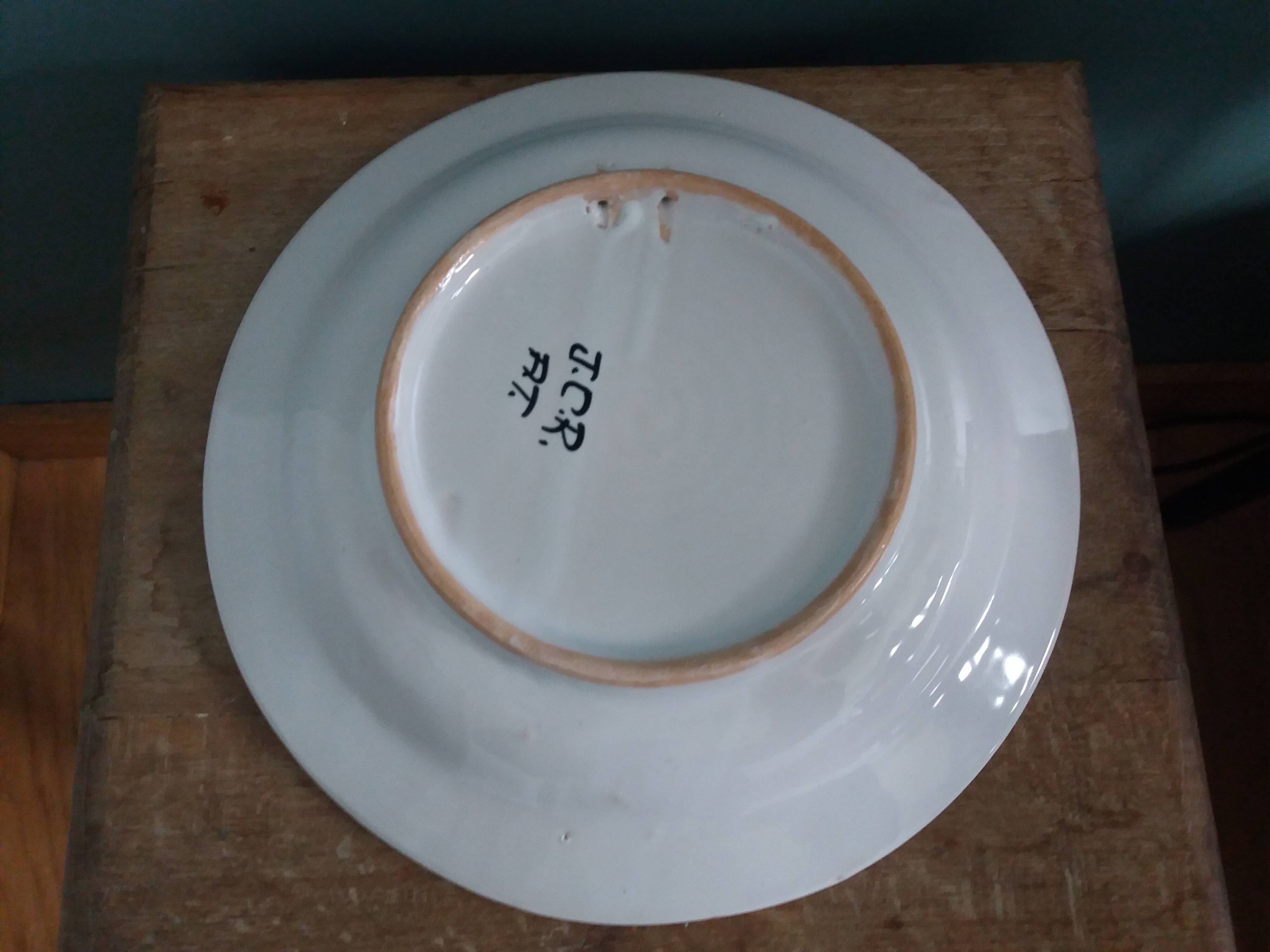 Decorative wall plate signed JCR