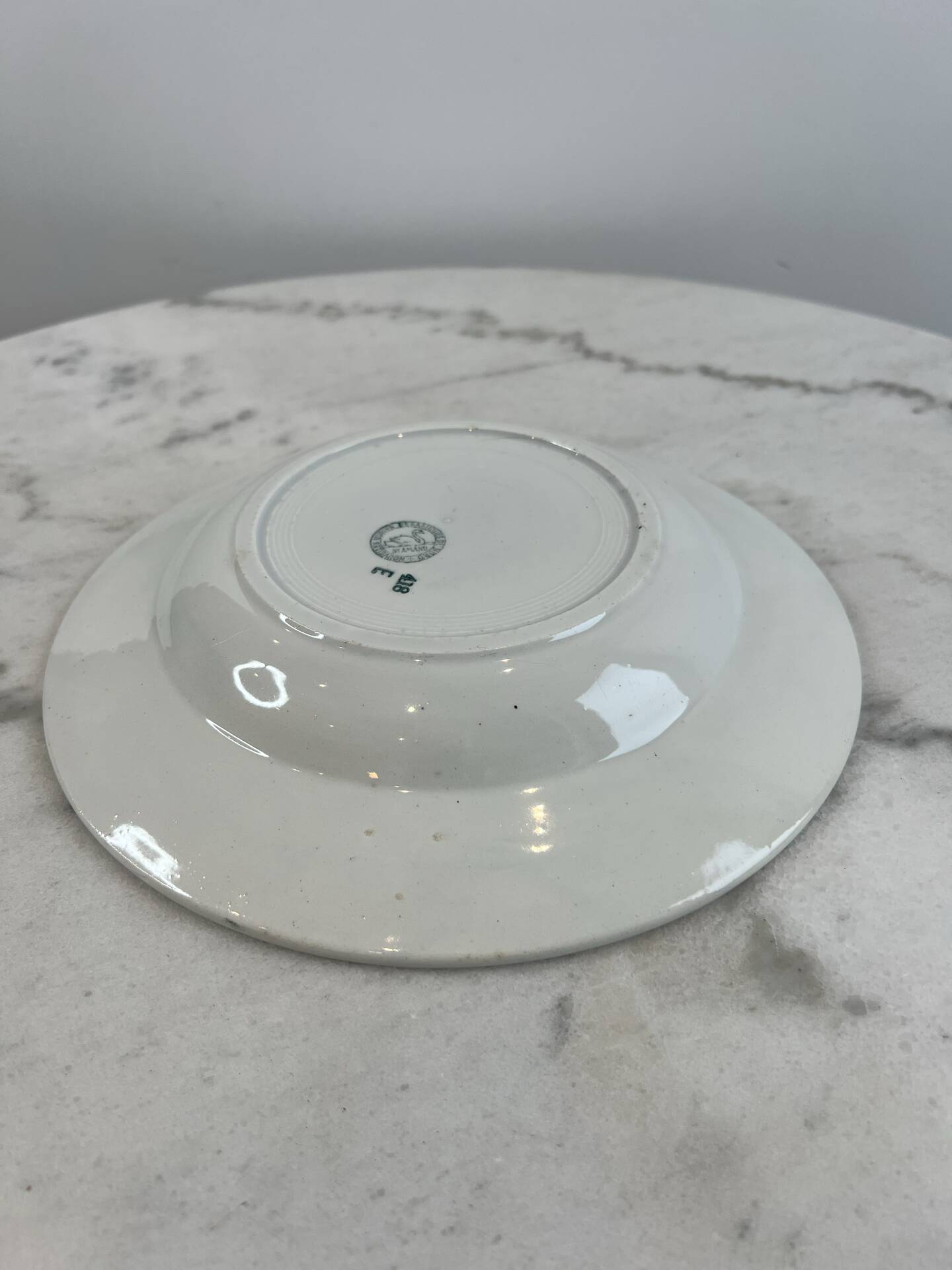 Set of 7 deep plates in earthenware, decorated with a green frieze.