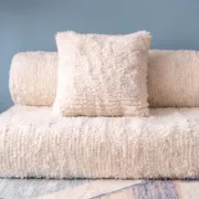 White Moroccan Arabic sofa with a rounded backrest.