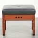 Ottoman en cuir noir au design Art Déco