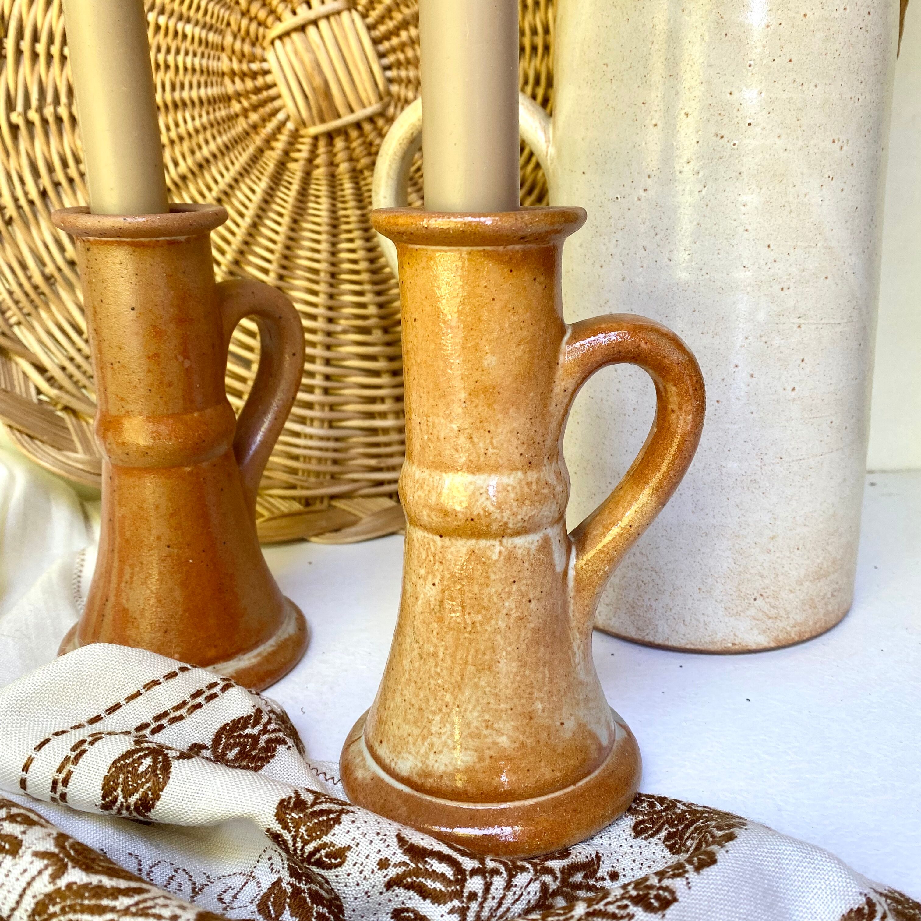 Pair of bohemian sandstone candle holders