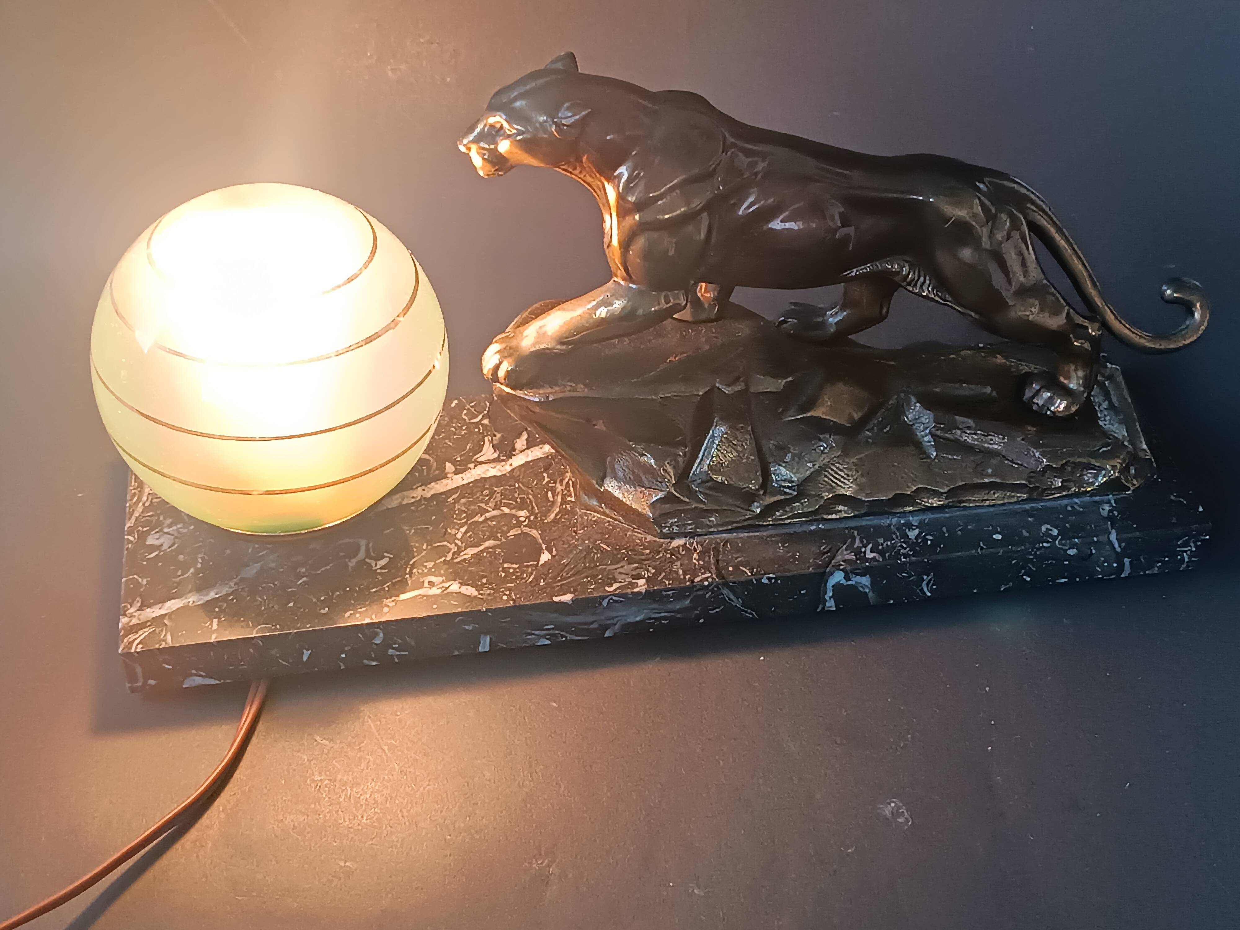 Panther desk lamp in spelter on a black and white marble base 1925