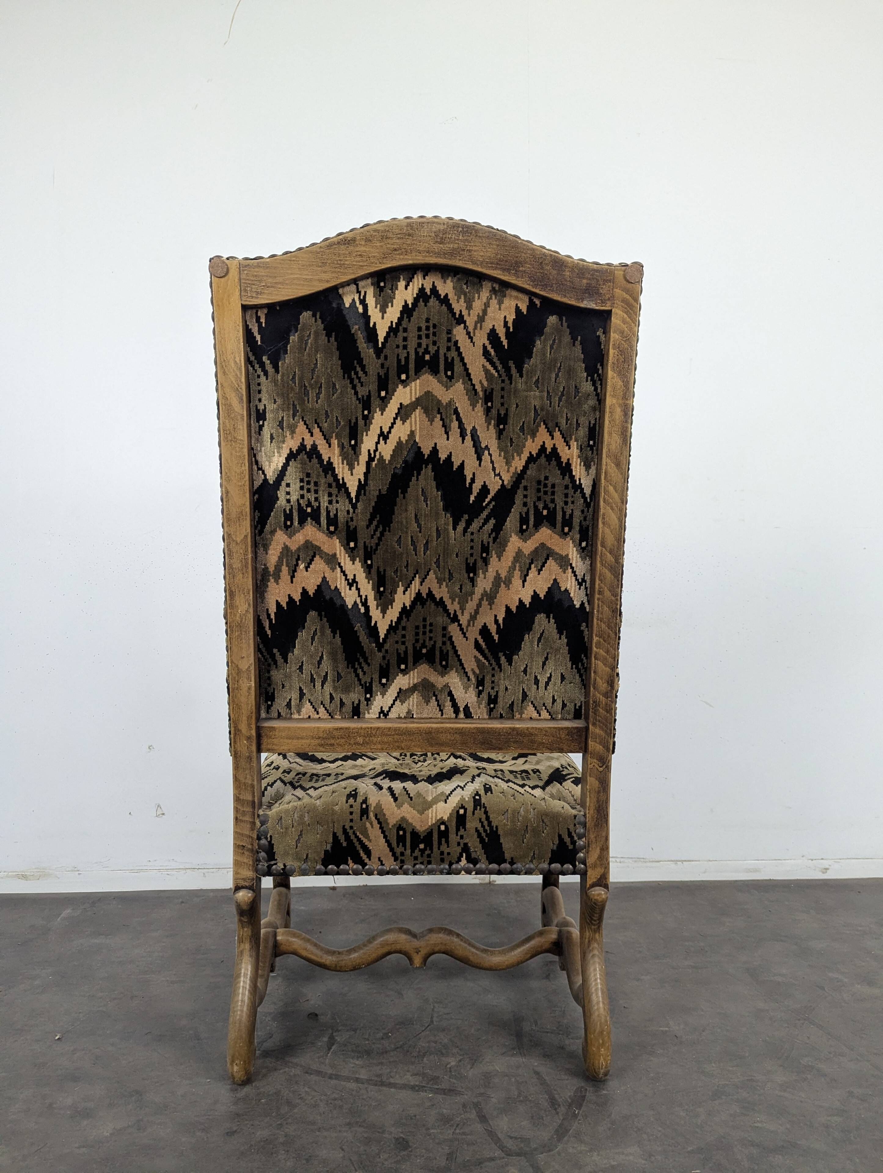 Louis XIII armchair with sheep bone in flame velvet