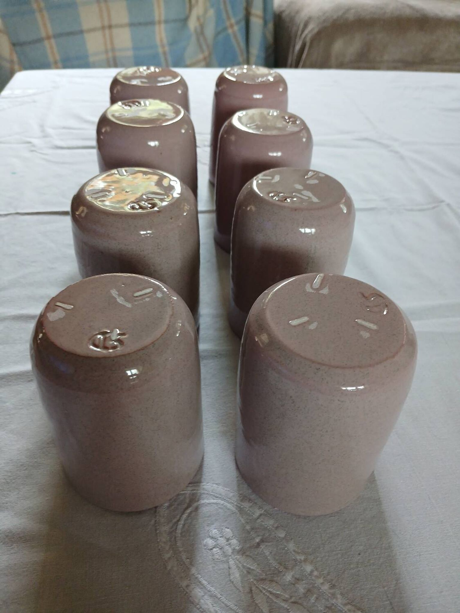 8 signed enamelled ceramic mugs