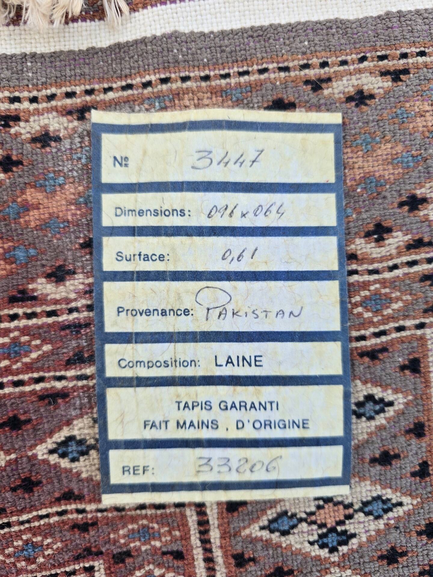Tapis pakistanais noué main en laine 110 × 62 cm – Authentique