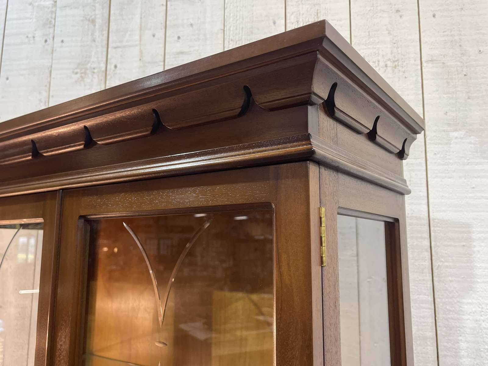 English display cabinet with two sections made of yew from the 1980s.
